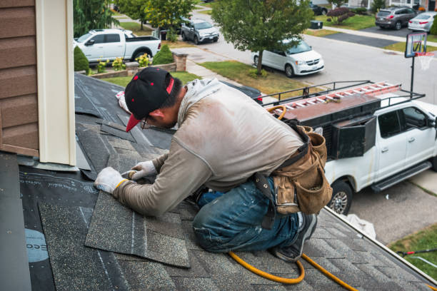 Professional Roofing technician working in Rowley, MA